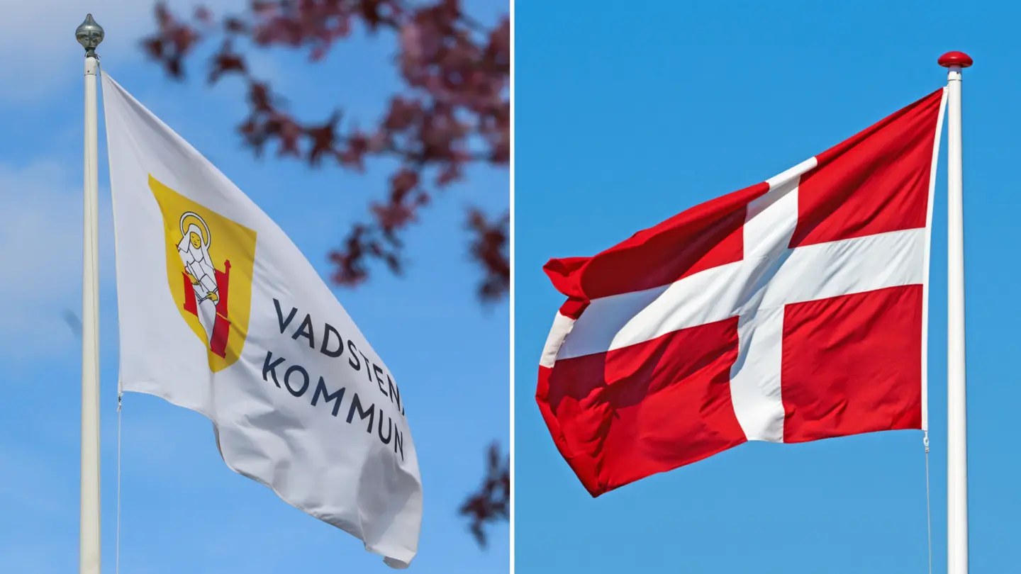 Vadstenas flagga och danska flaggan.