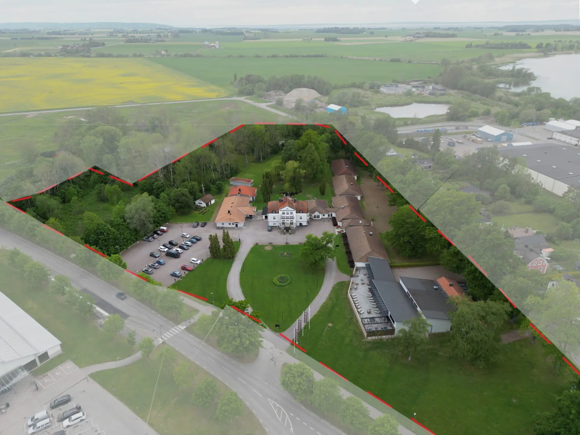 Flygfoto över Värdshuset 1, detaljplaneområde markerat